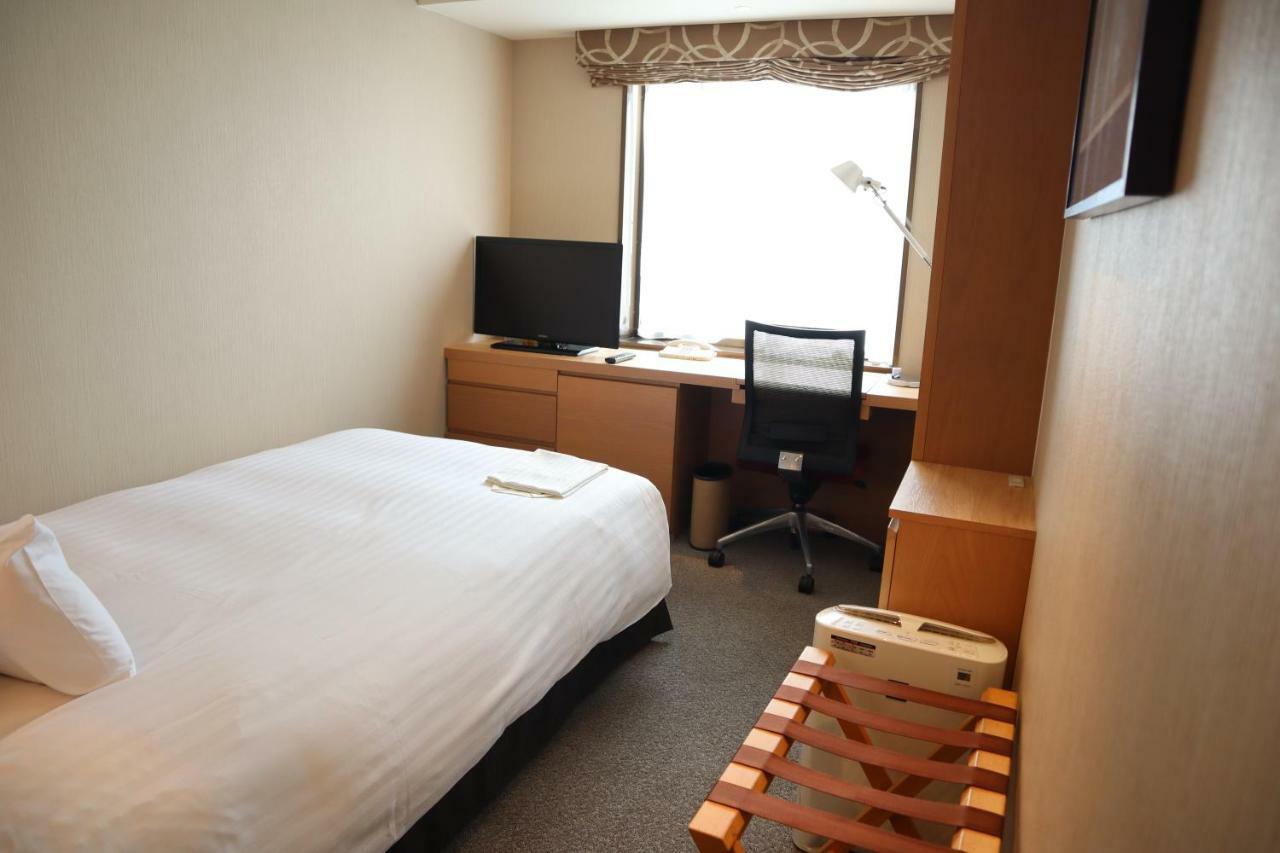 Hotel Associa Shizuoka Exterior foto A single room at the hotel